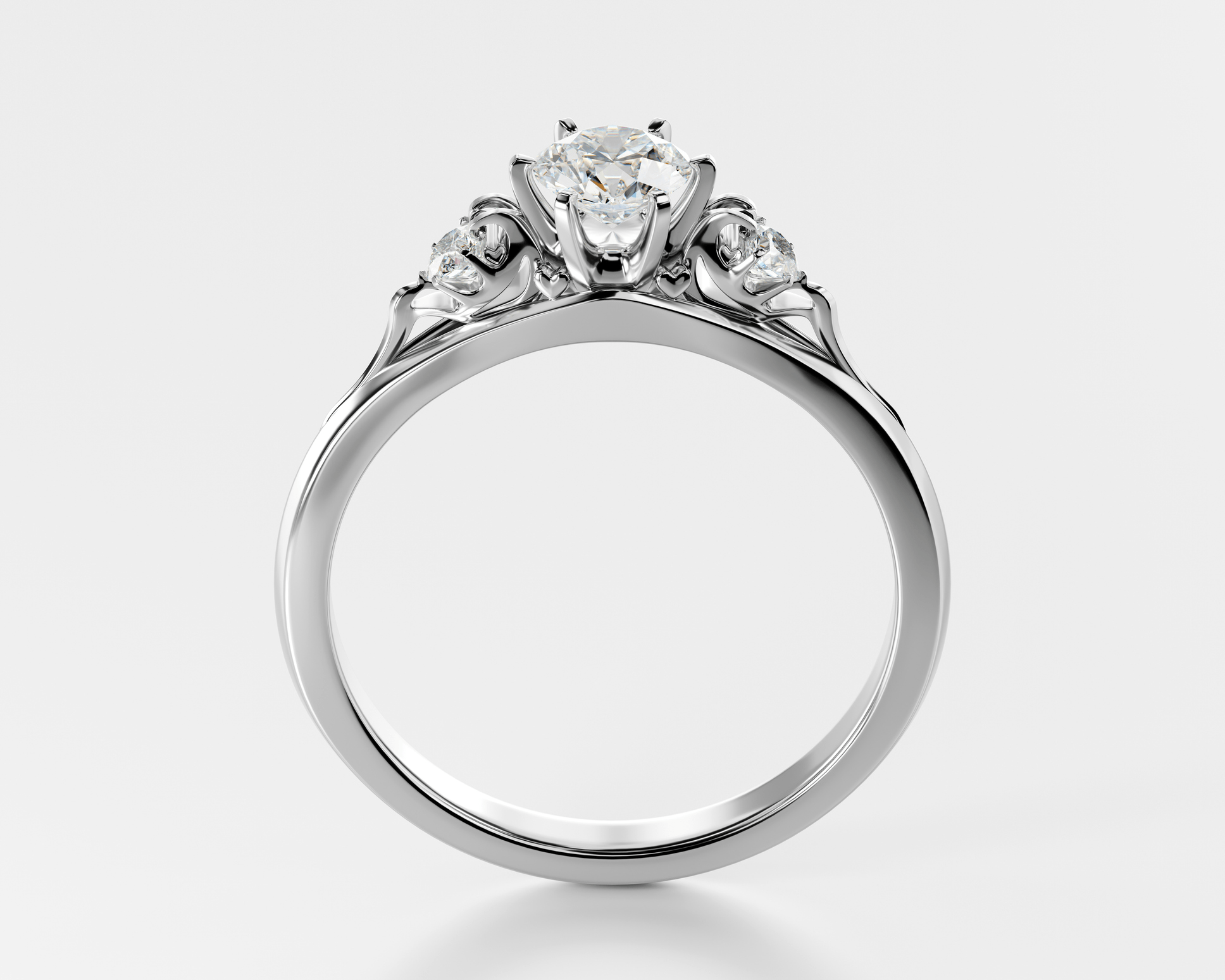 A stunning engagement ring featuring a central diamond flanked by two smaller diamonds, all set in an elegant band. This "Kronjuvel" diamond ring showcases a classic three-diamond design, symbolizing past, present, and future love.